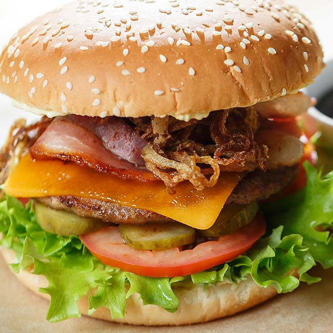 A Sports Bar favorite: cheeseburger with bacon, fried onions, and more in Spring Grove.